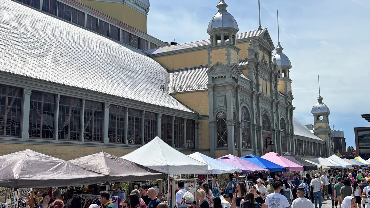 Vendors and visitors at the outdoor 613flea market at Lansdowne