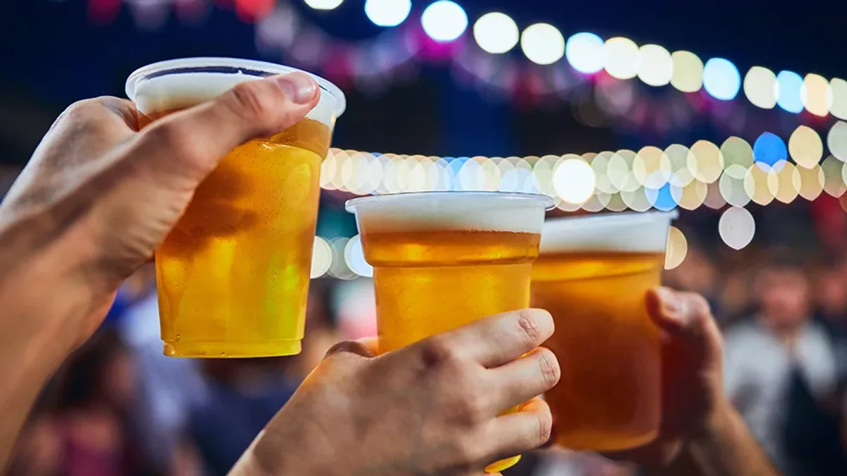 Glasses of craft beer raised in a toast