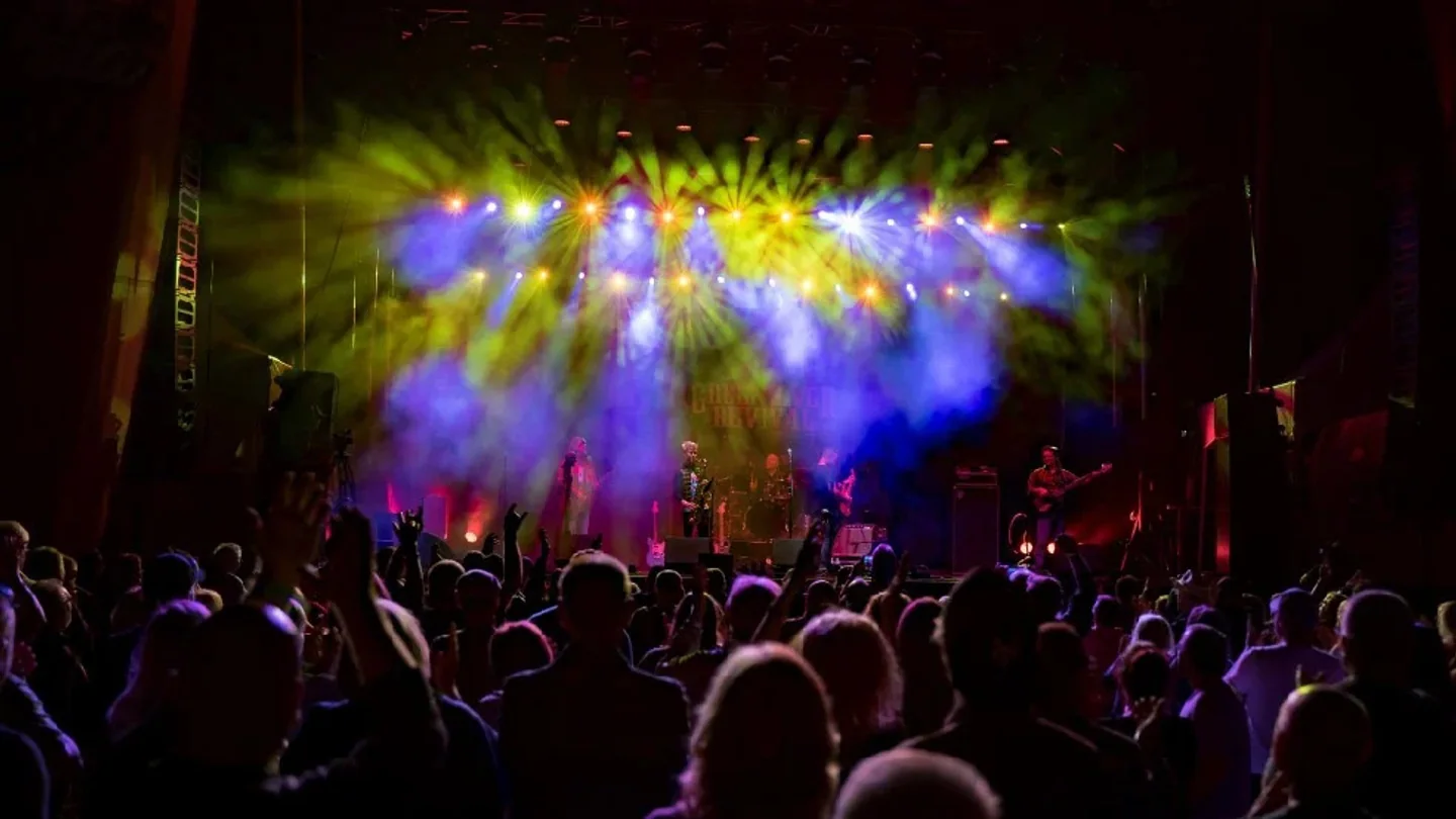 Crowd enjoying a live tribute performance at Nostalgia Music Festival in Ottawa