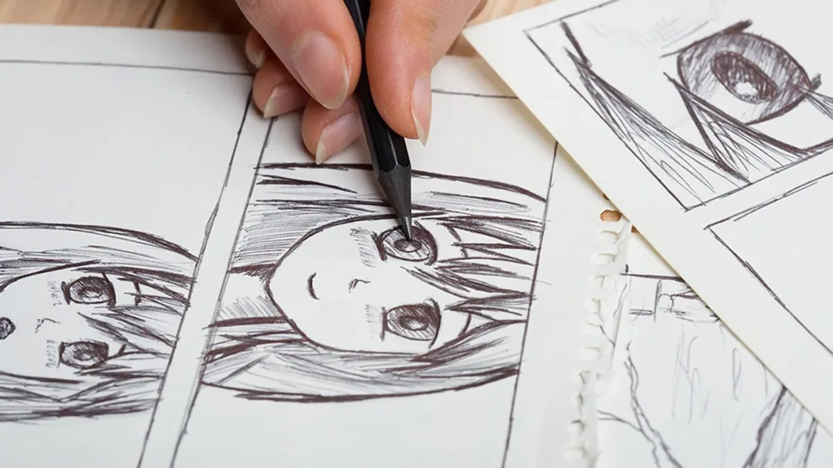 An artist drawing manga characters