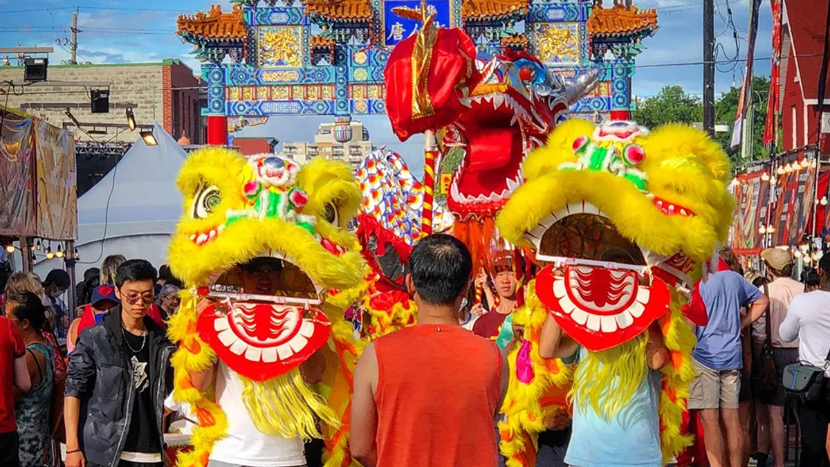 Lion dancers and visitors at the Ottawa Chinatown Night Market