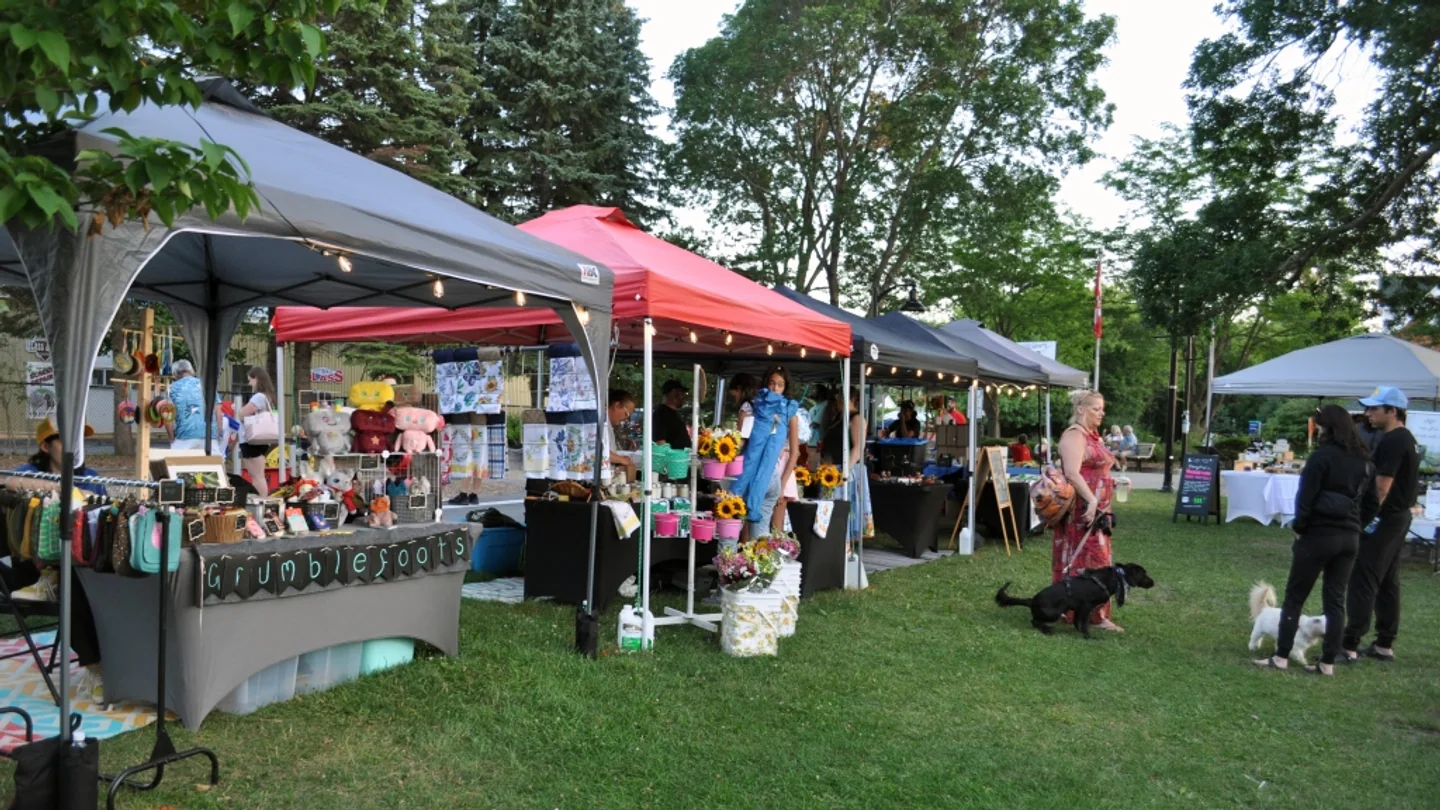 Vendor tents at a community market in Village Square Park, Stittsville